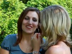 Two women gossiping Stock Footage