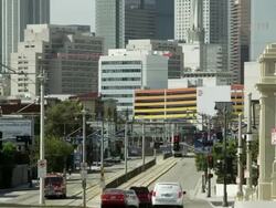 Upwards pan of city streets toward the sky scrapers in Los Angeles. Stock Footage