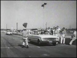 1960 Ford Falcon at the starting line Stock Footage