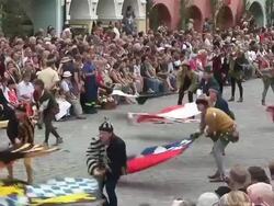 MS Men with standard bearer waving flags in medieval party / Landshut, Bavaria, Germany Stock Footage