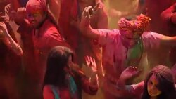 Group of people celebrating holi festival, Delhi, India Stock Footage
