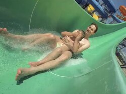 HD Super Slow-Mo: Father And Daughter Enjoying In Water Park Stock Footage
