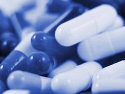 falling pills in blue tone Stock Footage
