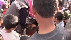 Food Aid at Turkish Red Crescent Refugee Camp News Clip