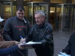Nick Mason of Pink Floyd poses with fans while departing from the SiriusXM Satellite Radio studio in New York Stock Footage