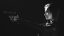 Sexy woman holding gun Stock Footage