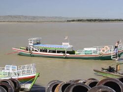WS View of river boat sails on Ayeyarwadi river / Bagan, Mandalay Division, Myanmar Stock Footage