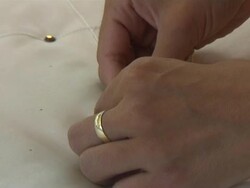 Button Sewing Stock Footage