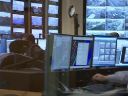 Technicians work in a transportation control and surveillance room in New York City. Stock Footage