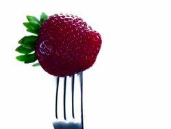 STRAWBERRY ROTATING ON FORK-LOOPED-1080HD Stock Footage