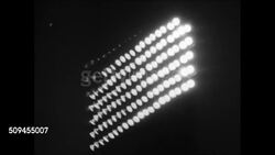 1950: EBBETS FIELD: NIGHT GAME: Unidentifiable Baseball player fielding ball from baseline. WS Field lights. Unidentified pitcher (#94) pitching, unidentified batter hitting, running to first base, first baseman catching ball, out.  Brooklyn Dodgers. Instructional Video
