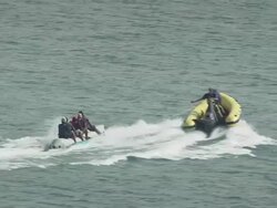 Riding An Inflatable At Sea Stock Footage