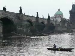MS One man fishing near charles bridge / Prague, Hlavni mesto Praha, Czech Republic Stock Footage