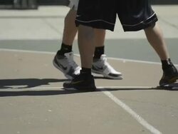 CU ECU R/F of basketball players feet as they play and dribble and shoot the basketball. Stock Footage