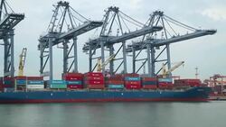 Shipyard working loading container cargo freight ship at sea Stock Footage