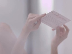 Woman with valentines card Stock Footage