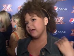 INTERVIEW: Rachel Crow on how she feels making the top 10, the thoughts of being able to star in a Pepsi Super Bowl commercial and how she choose the song for this weeks movie theme. Stock Footage