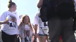 Tottenham Riots anniversary march - Five days of looting, rioting and clashes with the police shook England in August 2011. News Clip