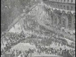 Aviator Charles Lindbergh rides through New York City in a huge parade. News Clip