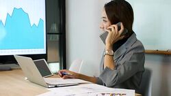 Close up Businesswoman working in the office with chart Computer monitor Stock Footage