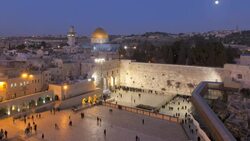 Pilgrims visit the Wailing Wall near the Dome of the Rock on the Temple Mount. Stock Footage