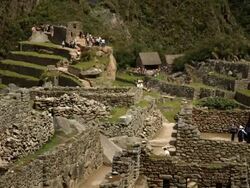 Tourists walking around machu picchu Stock Footage