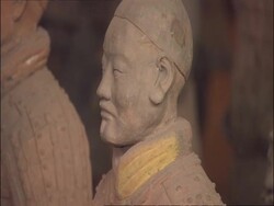 Zoom out from CU Terracotta Warrior to MS rows of Warriors, Museum of Qin, Xian, China Stock Footage