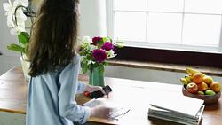 Woman with smartphone and mail Stock Footage