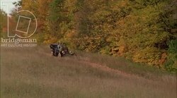 Man and woman driving in a car in the countryside, 1908 - reenactment, clip 2 Stock Footage