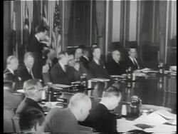 B/W 1949 PAN members of North Atlantic Council seated at large table in meeting / documentary Stock Footage