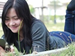 Tablet for lifestyle in playground,Bangkok Thailand:Dolly shot Stock Footage