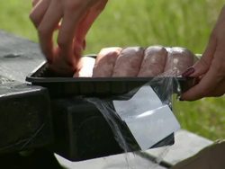Sausages Cooking on Barbecue News Clip