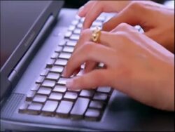 CU hands typing on laptop Stock Footage