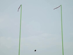 WS, LA, American football ball flying over goal, Staten Island, New York, USA Stock Footage