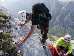 Men rock climbing in the mountains.  - 1920x1080 Stock Footage