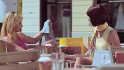 LD Female friend talking about a dress one bought over coffee Stock Footage