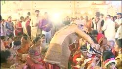 CLEAN : Tycoon hosts big fat Indian wedding amid cash crunch News Clip