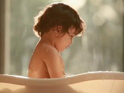 Baby washing in a bathtub Stock Footage