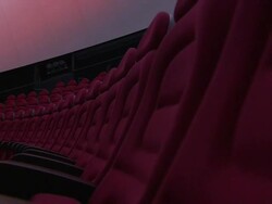 MS ZO View along row of deep red auditorium seat backs / Doha, Qatar  Stock Footage