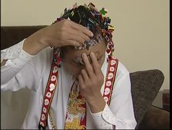 'Human pin cushion' entertains Olympic visitors News Clip