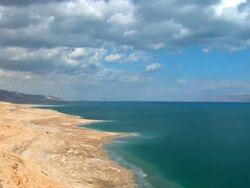 WS T/L View of dead sea with clouds moving in sky / Ein Gedi, Judean Desert, Israel Stock Footage
