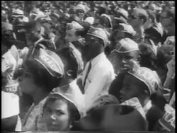 B/W August 28, 1963 interracial crowd with NAACP hats watching speech / March on Washington / newsreel Stock Footage