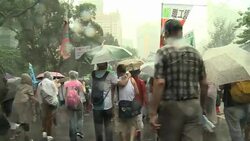 CLEAN : Tens of thousands in H K stage rain hit News Clip