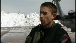 US Marines help clear runway at air base for aid shipments News Clip