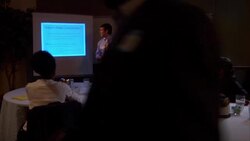 MS, PAN, Man giving presentation in conference room Stock Footage