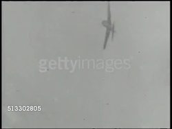 1942: BATTLE OF MIDWAY: AERIAL:  VS DOGFIGHT Chasing & shooting down Imperial Japanese fighter aircrafts. XWS Three (3) Mitsubishi A6M Zero ('Zeke') fighter planes flying, descending. World War II, WWII, Pacific Front Instructional Video