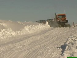 Sno-cat carrying cargo from the supply ship RRS Ernest Shackleton. Stock Footage