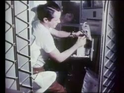 Astronaut taking soap from box in zero gravity Stock Footage