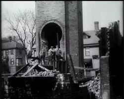 Watertown, Mass. - Felling of 150ft. chimney. News Clip