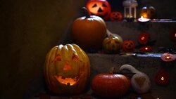 Halloween pumpkin decoration on stone stairs Stock Footage